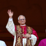 Pope Leo XIV (Robert Francis Prevost) addresses the crowd from the balcony of St. Peter's Basilica, delivering his first message as the first American pope.