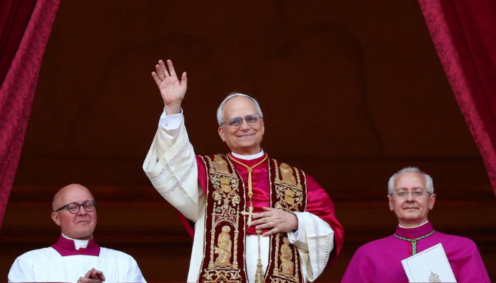 Pope Leo XIV (Robert Francis Prevost) addresses the crowd from the balcony of St. Peter's Basilica, delivering his first message as the first American pope.