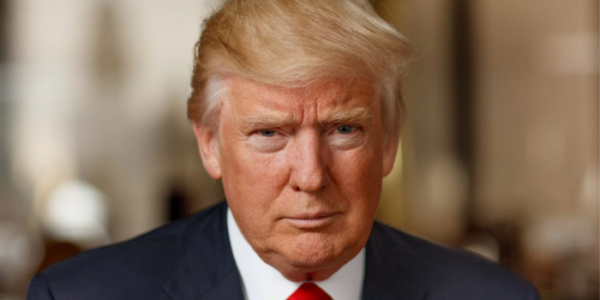 Donald Trump speaking at a press conference about new executive order on drug pricing reform