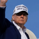 Donald Trump waving while exiting Air Force One during EU trade talks.