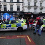 Ambulance and paramedics at Liverpool parade scene after vehicle hits fans
