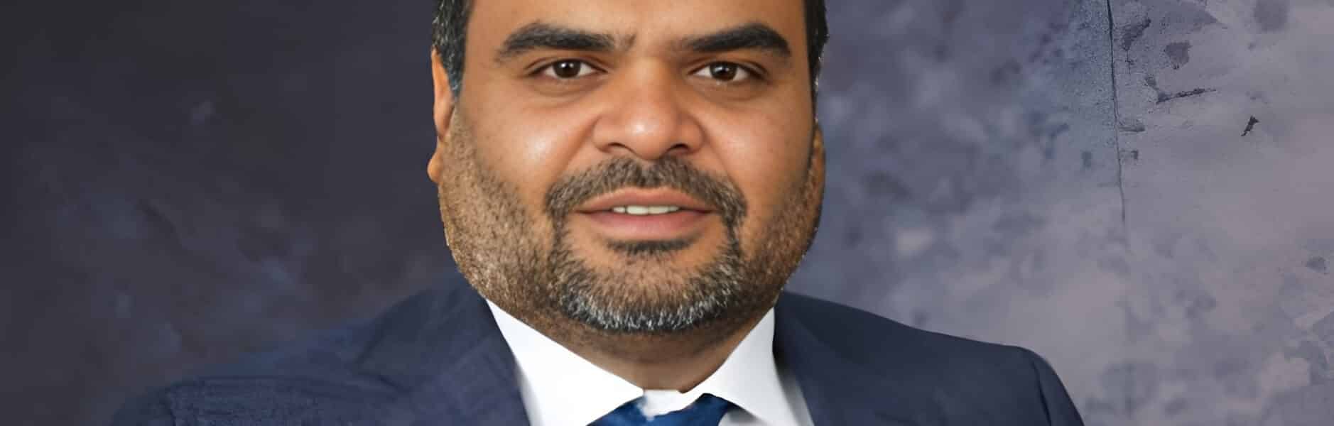 Portrait of Anil Jain associated with Refex Industries and its business expansion.