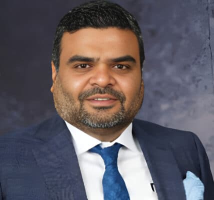 Portrait of Anil Jain associated with Refex Industries and its business expansion.