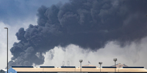 Black smoke rising over Dubai financial district after explosions