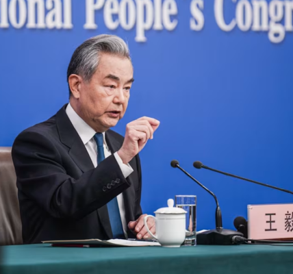 Chinese Foreign Minister Wang Yi speaking at a press conference during China’s Two Sessions in Beijing, March 8, 2026.