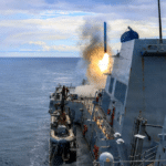 US military missile launch during Iran conflict showing Tomahawk cruise missile and Patriot air defense system usage